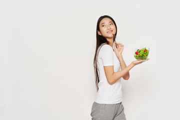 Wall Mural - young woman holding a bunch of flowers