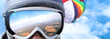 Goggles of a skydiver reflecting the landscape scenery below