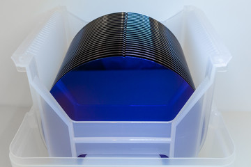 Poster - Close up of Silicon wafers blue color prepared for production in a semiconductors manufacturing facility