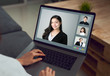 © sitthiphong - Businesswoman making video call meeting to team online.