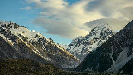 Sticker - Mount Cook in the morning, fast-moving clouds and sunlight hit the mountains, creating a beautiful dimension in timelapse photography in mount cook national park , new zealand