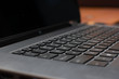 Close up macro of laptop keyboard and screen