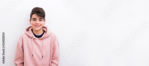 Fotomural young teenager boy smiling isolated on white background