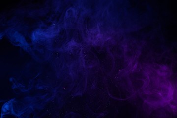 Wall Mural - abstract blue and pink fog with shiny particles dark background