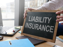 Business photo shows printed text liability insurance