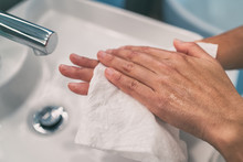 Washing Hands Steps For Personal Hygiene COVID-19 Prevention Drying Hand With Paper Towel After Handwash. Coronavirus Infection Preventive Cleaning.