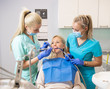 © Kaspars Grinvalds - Female patient having dental examination in dentist office