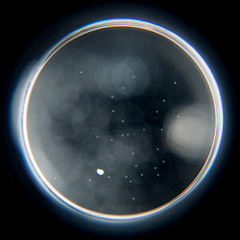 abstract background with a black hole. sphere on black background.