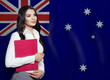 © millaf (Nemchinova) - Young woman with red book. Learn or business concept