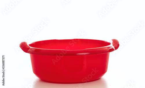 Fotomural Cleaning washbowl red color isolated against white background,