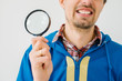© aeroking - on a gray background young man with a magnifying glass