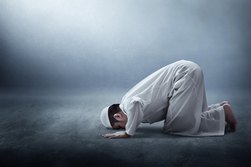 Poster - Religious asian muslim man praying