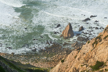 Rock shore and green cliff of Europe