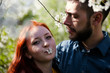 © DariaTrofimova - Young couple  walking in   spring garden.