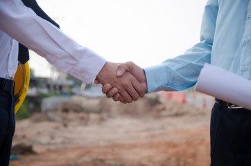 Wall Mural - Shaking hands with engineers and architects agree with the success of the construction project.