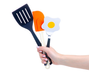 Sticker - kitchen utensils tools in hand on white background isolation