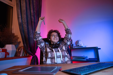 Aufkleber - Excited digital desinger raising hands up to express gesture of success holding graphic pen