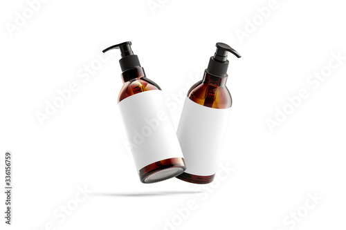 Fotografía Blank amber glass pump bottle with white mockup, no gravity