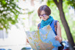 © aeroking - Woman tourist with map