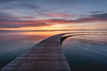 Denmark, Aarhus, Long Exposure Of Infinite Bridge And Aarhus Bay At Sunrise