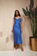 © indiraswork - Pretty beautiful woman brunette hair natural makeup wear fashion clothes sexy blue silk long dress midi style date party walk sandals interior studio stairs flowerpot summer journey romantic.