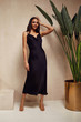 © indiraswork - Pretty beautiful woman brunette hair natural makeup wear fashion clothes sexy black silk long dress midi style date party walk  interior studio stairs art chair flowerpot summer journey romantic.