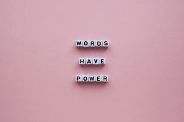 words have power, on a pink background