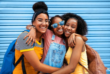 African Girls Embraced. Three Beautiful Smiling Teenage African