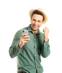 Canvas Print - Cool young man with mobile phone dancing against white background