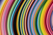 © Robert Kohlhuber/Stocksy - Multi colored quilling paper lying on colorful paper