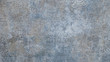Old gray blue vintage shabby patchwork motif tiles stone concrete cement wall texture background