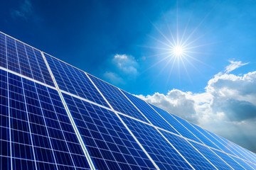 photovoltaic solar power panel on sky background,green clean alternative energy concept.