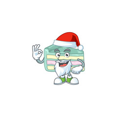 Sticker - Friendly vanilla slice cake Santa cartoon character design with ok finger