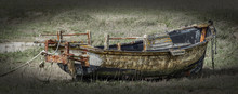 Wrecked Boat Sitting On Tired Up River Bed