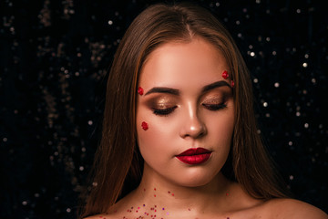 portrait of a girl on a shiny background