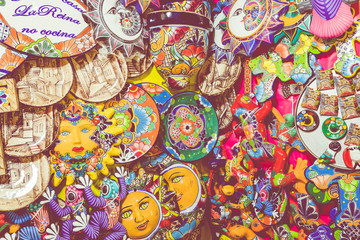 Wall Mural - Colorful traditional Mexican pottery. Talavera style. Souvenirs on sale in local market of Guanajuato, Mexico.