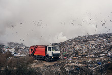 Burning Garbage Dump Pollutes The Environment. Strong Wind Rises Toxic Smoke Of Burning Garbage Into The Air