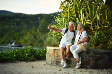 Wall Mural - Portrait of elderly couple of backpackers