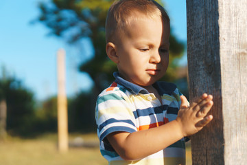 Sticker - boy playing with wooden pile