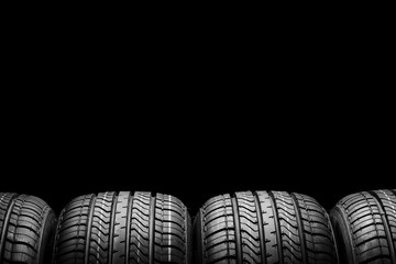 a  black isolation rubber tire, on the black backgrounds