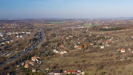 Wall Mural - Highway with trucks and cars passing by aerial drone footage, M1, Hungary