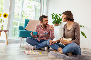 Wall Mural - Couple playing ludo