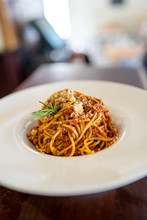Spaghetti Bolognese Served On A White Plate