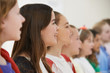 © highwaystarz - Group Of School Children Singing In Choir Together