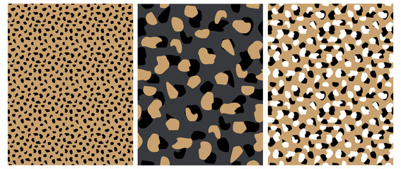 Abstract Leopard Skin Seamless Vector Patterns. White, Brown and Black Irregular Brush Spots on a Gray and Gold Backgrounds.  Abstract Wild Animal Skin Print. Simple Irregular Geometric Design.