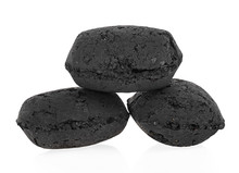 Briquettes Of Charcoal Isolated On A White Background
