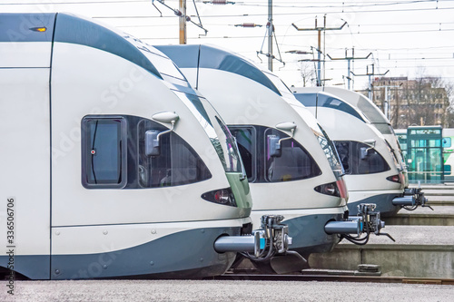 Fotomural Passenger trains cabin locomotive in a row on the platform of the station