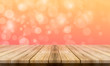 © Dompet Masa Depan - Empty wooden table with a beautiful colour bokeh background