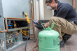 © spatesphoto - Checking refrigerant charge on heat pump