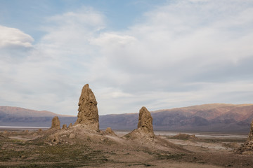 Canvas Print - cloudy sky above Trona Pinnacles California at sunset 